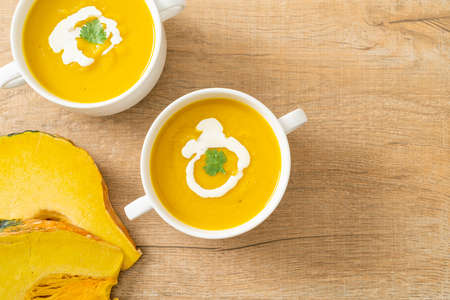 pumpkin soup in white bowl - Vegetarian and vegan food styleの写真素材