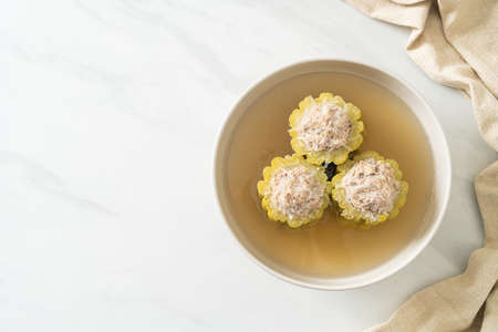Stuffed bitter gourd with seasoned minced pork and vermicelli soup bowl