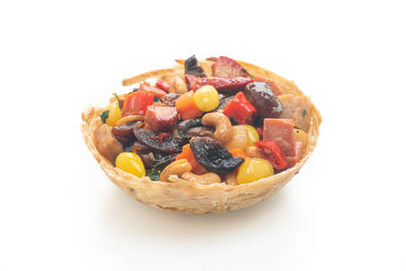 Stir fried mixed Chinese fruits and nuts isolated on white backgroundの写真素材