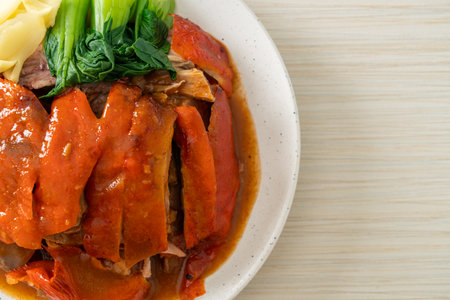 Peking duck or Roasted duck in Barbecue Red Sauce - Chinese food styleの写真素材