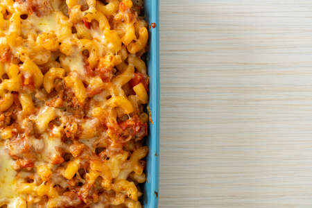 homemade baked macaroni bolognese with cheese - Italian food styleの写真素材