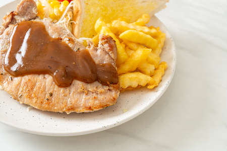 pork steak with black peppers gravy sauce and mini salad