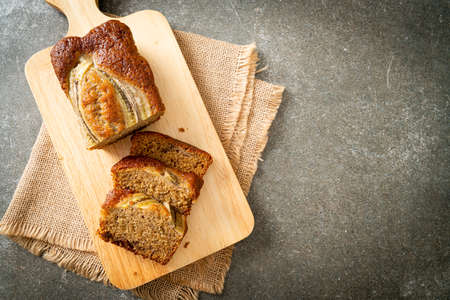 banana cake sliced on wood board