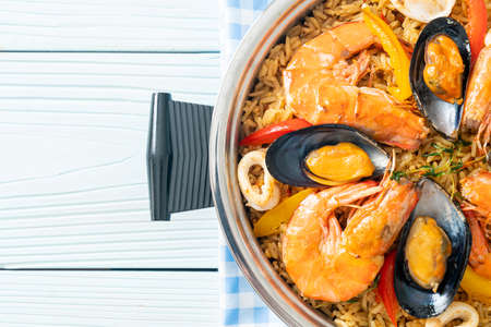 Seafood Paella with prawns, clams, mussels on saffron rice - Spanish food styleの写真素材