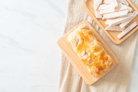 delicious taro toast bread on wood board