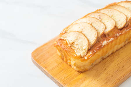 apple loaf crumbled cake on wood boardの写真素材