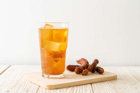 Delicious sweet drink tamarind juice and ice cube - healthy drink styleの写真素材