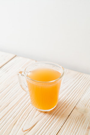 fresh and hot ginger juice glass with ginger roots - Healthy drink styleの写真素材