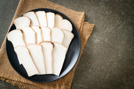 fresh King oyster mushroom or King trumpet mushrooms on plateの写真素材