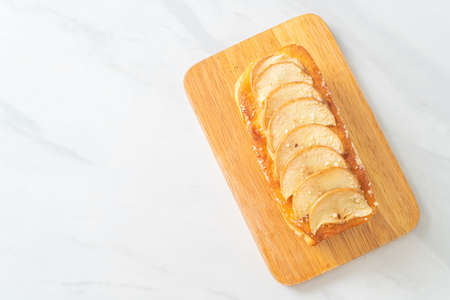 apple loaf crumbled cake on wood board