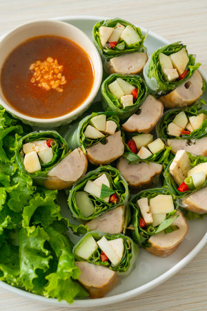 Vietnamese meatball wrap or Vietnamese salad roll or Namnueng or Nem Nuong - Asian food styleの写真素材