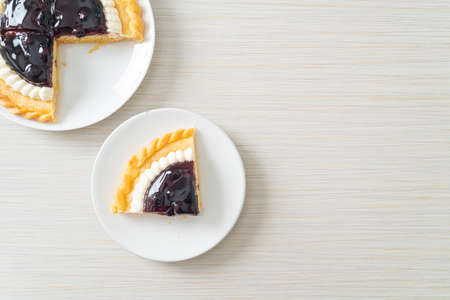 Delicious Blueberry Cheese Pie on white plateの写真素材