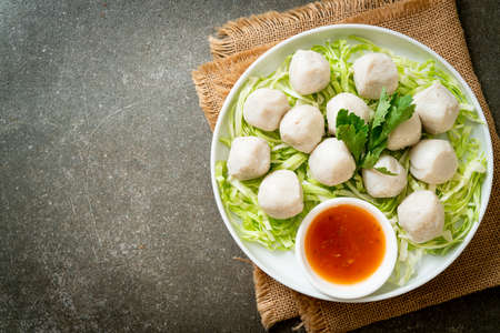 Boiled Fish Balls with Spicy Dipping Sauceの写真素材