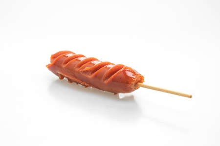 fried sausage skewer isolated on white backgroundの写真素材