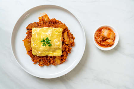 kimchi fried rice with pork and topped cheese - Asian and fusion food styleの写真素材