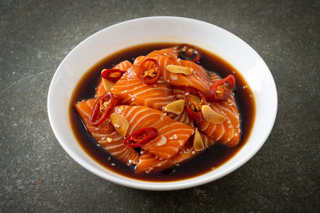 fresh salmon raw pickled in shoyu sauce or soy sauceの写真素材