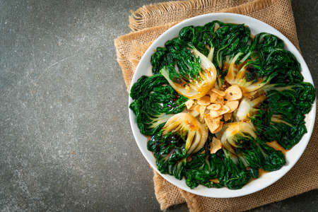 baby Chinese cabbage with oyster sauce and garlic - Asian food style