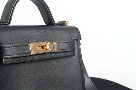 beautiful woman leather fashion bag isolated on white background