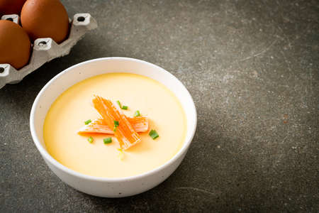Steamed egg with crab stick and spring onionの写真素材
