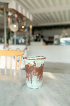 ice chocolate mint milkshake glass on tableの写真素材