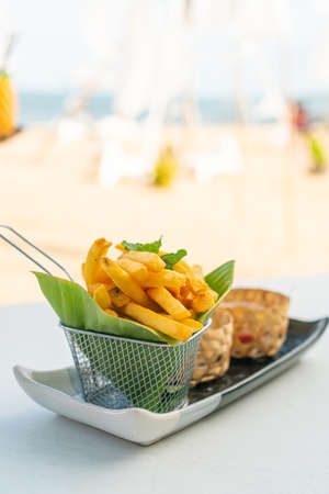 potato chips or french fries on plate