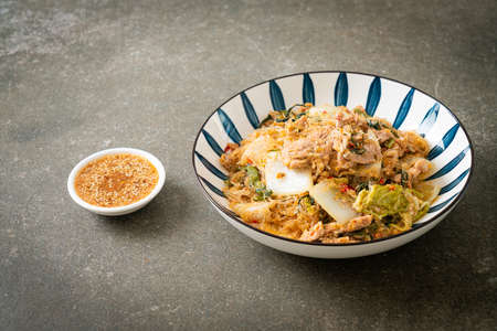 Stir-Fried Thai Styled Sukiyaki or Stir-fried vermicelli with pork and vegetables in sukiyaki sauce - Asian food styleの写真素材