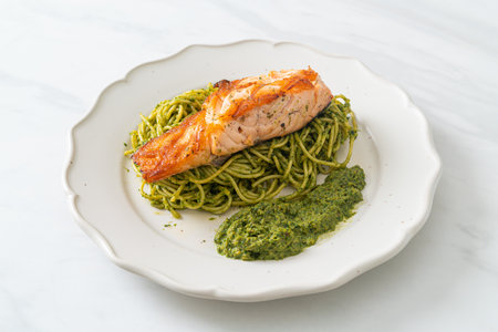 Spaghetti pesto with grilled salmon - Italian food styleの写真素材