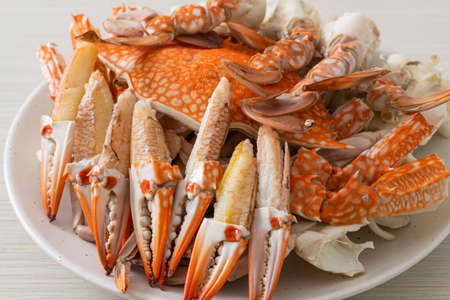 Steamed blue crab with spicy seafood sauce - seafood styleの写真素材