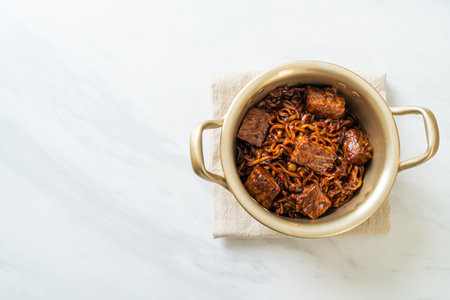 Jjapaguri or Chapaguri, Korean Black Beans Spicy Noodles with Beef - Korean food styleの写真素材