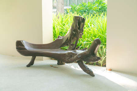 empty beautiful wood bench in gardenの写真素材