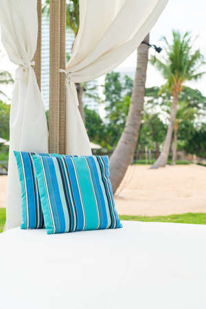 comfortable pillow on pavilion near beach - travel and vacation conceptの写真素材