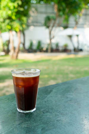 iced americano coffee glass on table in coffee shop cafe and restaurantの写真素材