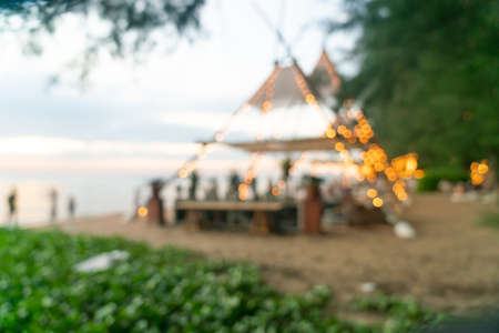 abstract blur beach cafe restaurant with bokeh light for background