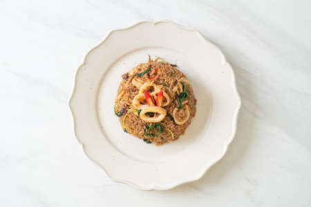 fried rice with squid and basil in Thai style - Asian food styleの写真素材