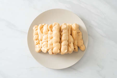 almonds meringue stick on plate - French snack dessert styleの写真素材