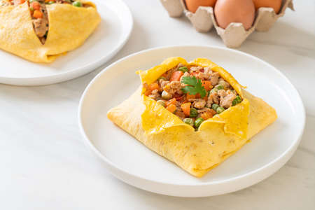 egg wrap or stuffed egg with minced pork, carrot, tomato and green pea