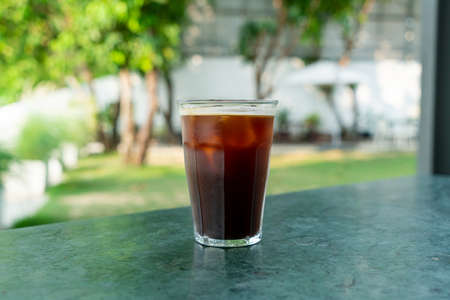 iced americano coffee glass on table in coffee shop cafe and restaurantの写真素材
