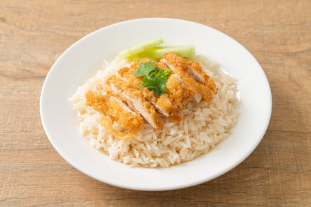 Steamed Rice with Fried Chicken or Hainanese Chicken Rice - Asian food styleの写真素材