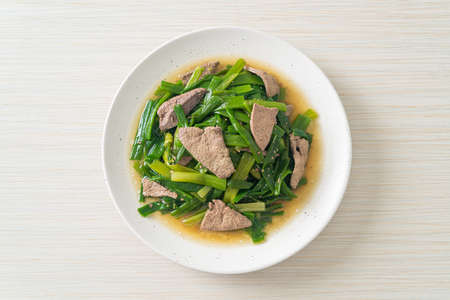 Stir-fried onion flower stem with pork liver - Asian food styleの写真素材