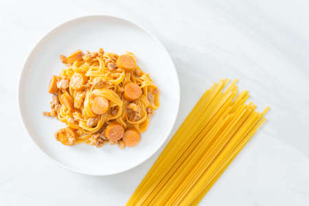 homemade spaghetti pasta sausage and minced porkの写真素材