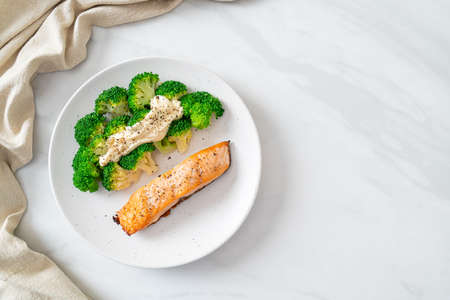 grilled salmon fillet steak with broccoli - healthy food styleの写真素材
