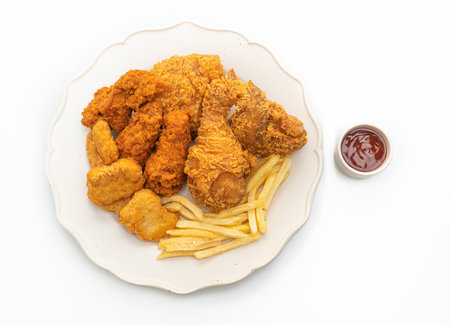 fried chicken with french fries and nuggets isolated on white backgrpundの写真素材