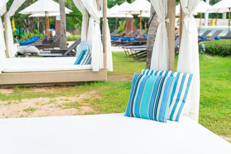 comfortable pillow on pavilion near beach - travel and vacation conceptの写真素材