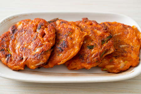 Korean Kimchi pancake or Kimchijeon - Fried Mixed Egg, Kimchi, and Flour - Korean traditional food...