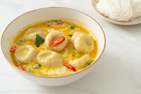 Green curry soup with Fish ball - Thai food styleの写真素材
