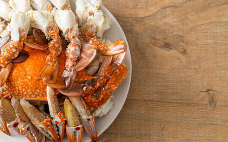 Steamed blue crab with spicy seafood sauce - seafood styleの写真素材