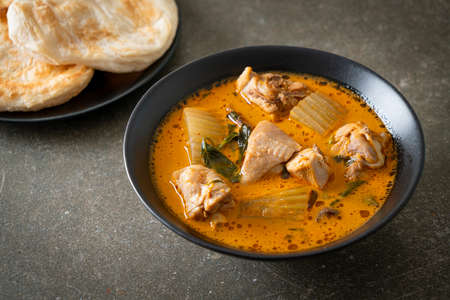 Chicken curry soup with roti or naan with chicken tikka masala - Asian food styleの写真素材