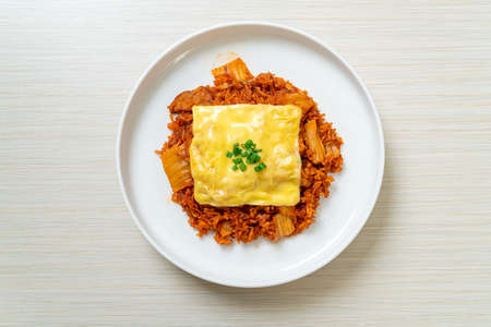kimchi fried rice with pork and topped cheese - Asian and fusion food styleの写真素材