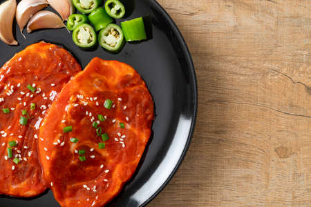 pork Korean marinated or fresh pork raw marinated with Korean spicy paste for grilling in Korean styleの写真素材