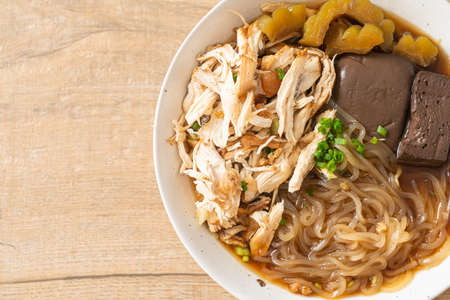 Stewed Chicken Noodle in Brown Soup Bowl - Asian food styleの写真素材